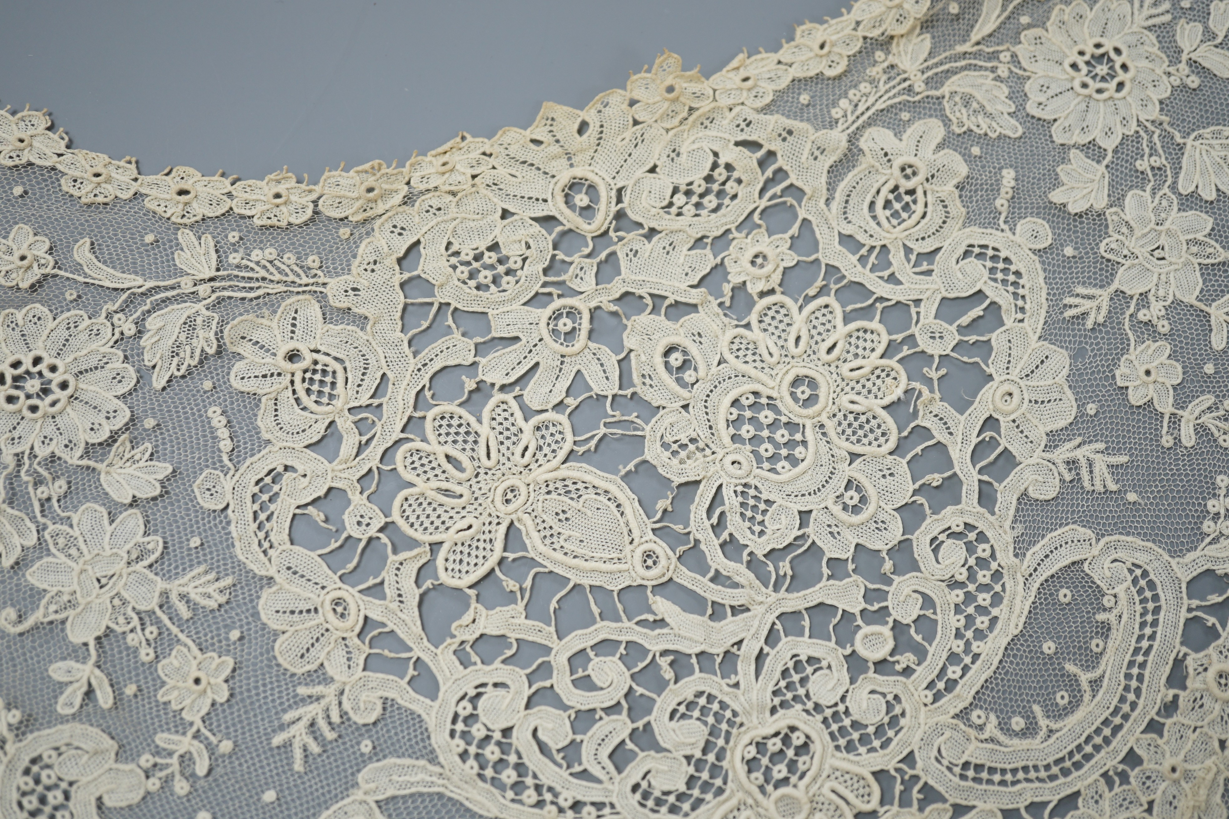 A mixed Brussels lace berth with fine needle lace floral insertions, together with a mixed bobbin veil and needleworked Brussels stols